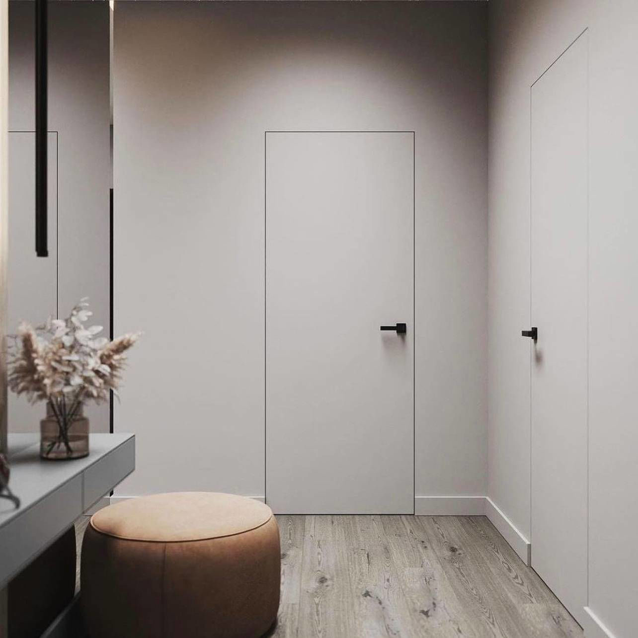 Concealed doors with smooth painted finish in a minimalist interior