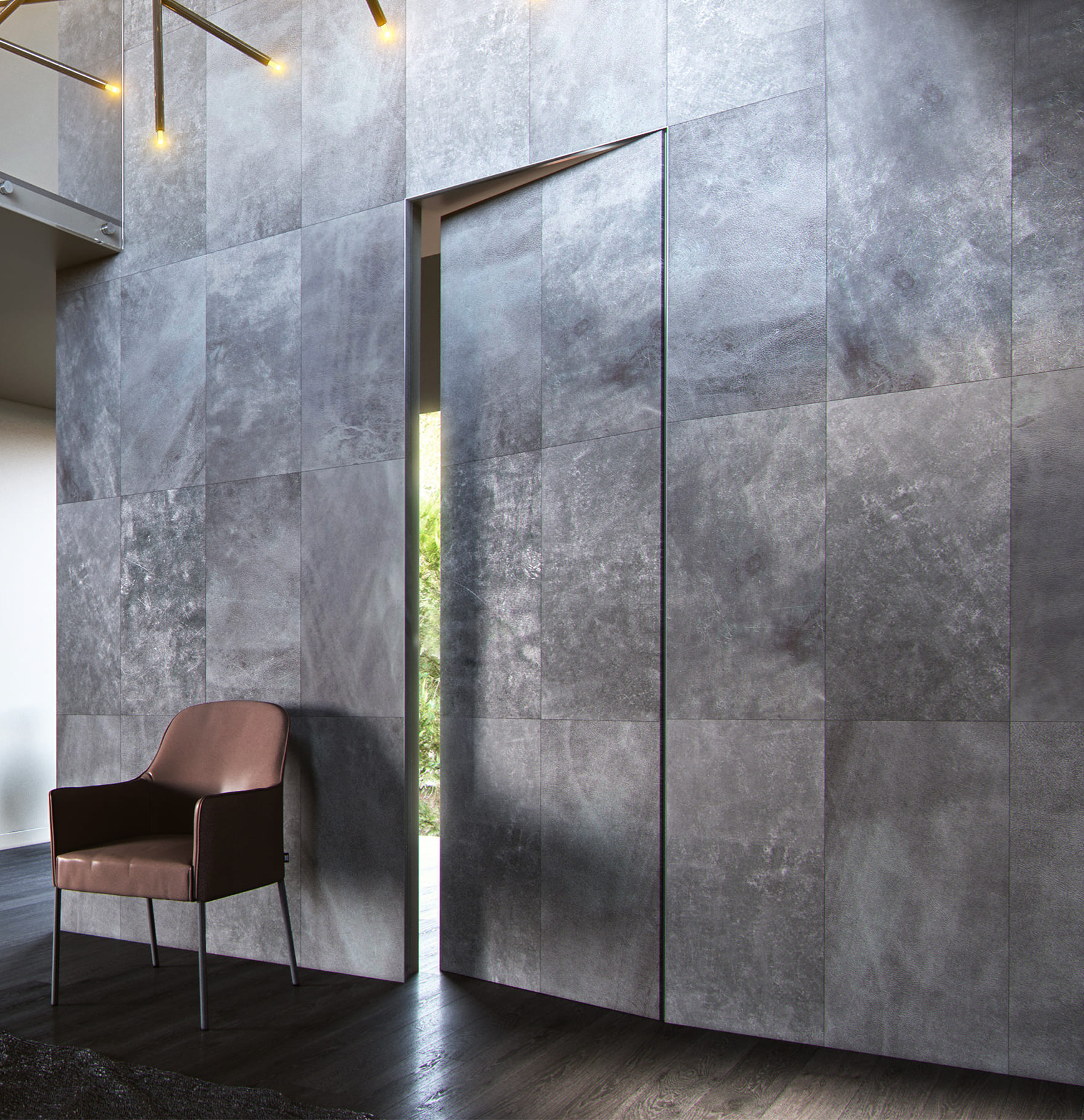 Custom concealed door solution with wall-integrated grey tiles and seamless finish